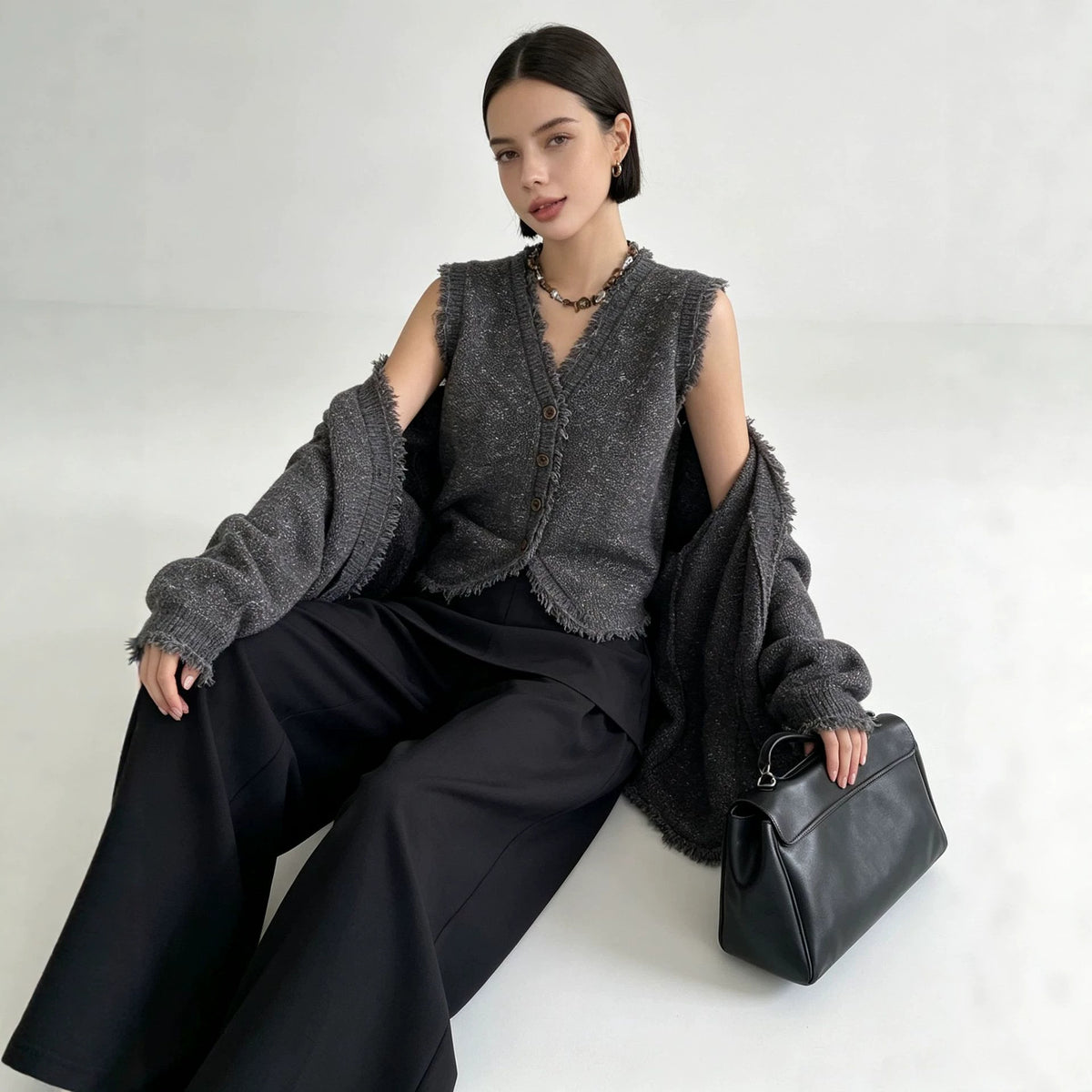 Two piece set of tassel fringed vest cardigan
